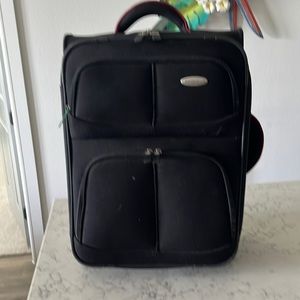 Samsonite 1910 carry on soft sided luggage.